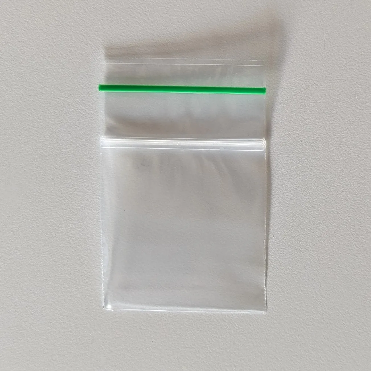 2" x 2" x 2 mil XX-Small Clear Landfill-Biodegradable Plastic Ziplock Bags with Resealable Zipper, Green Line (1,000 Bags, 100 Bags/Pack, 10 Packs/Case)